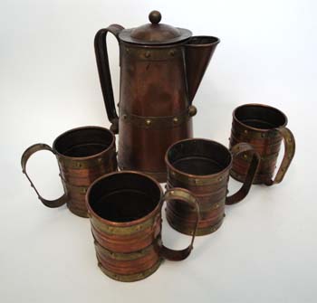 BRASS AND COPPER PITCHER WITH MUGS